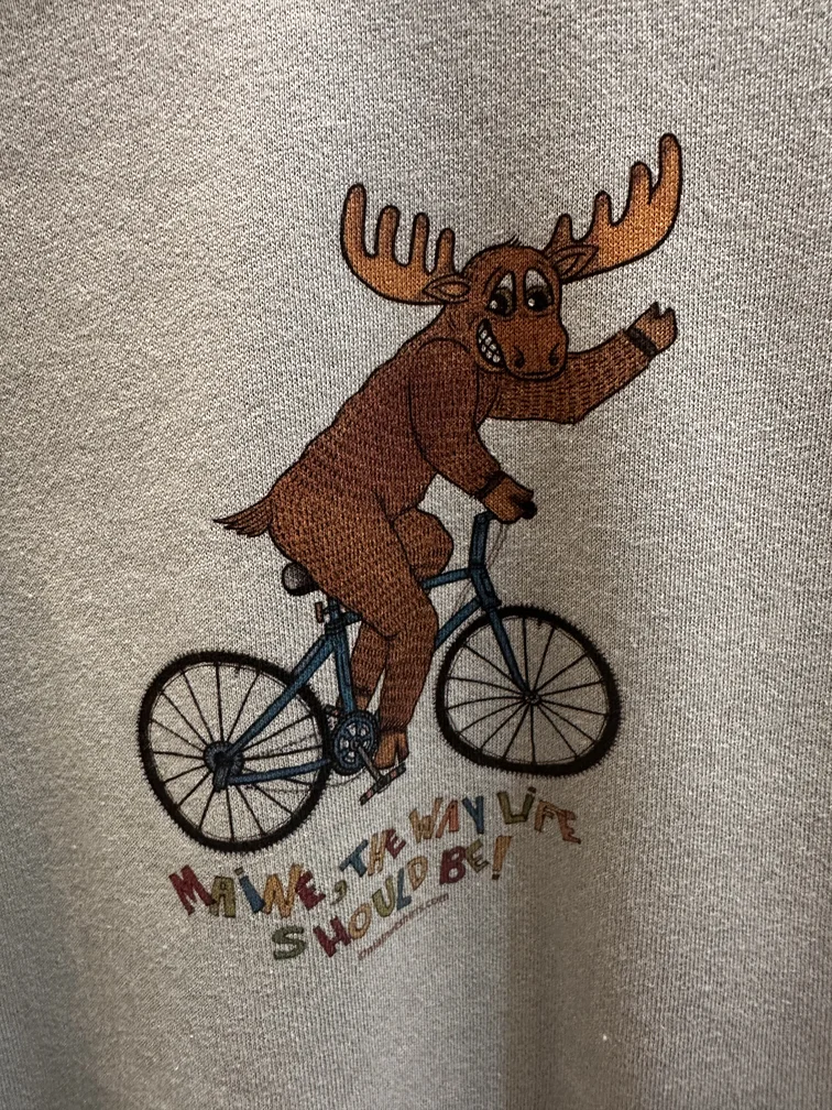 Maine Moose Riding a Bicycle – Crop Sweatshirt